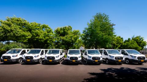 UO Motor Pool vans in parking lot